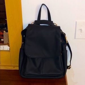 A Mini Black Backpack